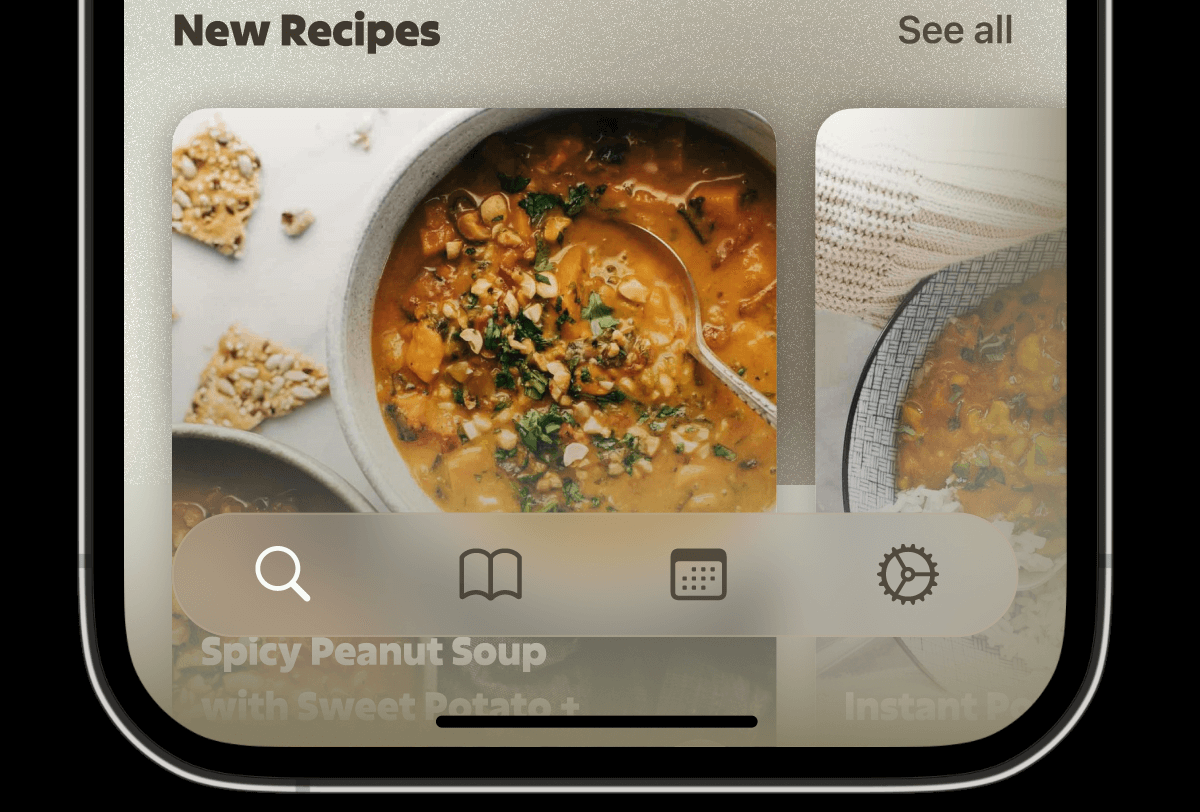 App screen featuring a 'New Recipes' section with an 
                image of 'Spicy Peanut Soup with Sweet Potato' prominently shown. 
                The app's navigation bar at the bottom includes icons for search, 
                a book for the recipe list, a calendar for the meal planner, 
                and a gear for settings. The text 'See all' appears in the upper right corner, 
                indicating there are more recipes to view.